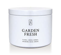 White tin candle with 'Garden Fresh' text on a white background by Kringle Candle