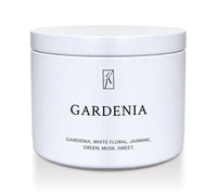 White tin candle container labeled 'Gardenia' with a brand logo on a white background