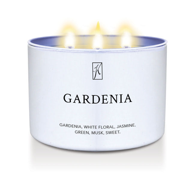 Candle in a white tin container labeled 'Gardenia' on a white background by Kringle Candle