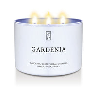 Candle in a white tin container labeled 'Gardenia' on a white background by Kringle Candle