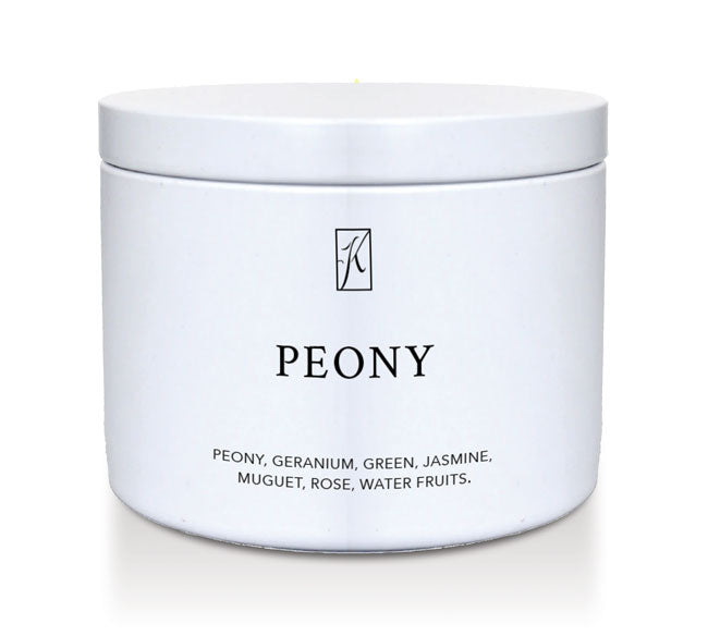 White tin container with 'PEONY' branding and product description on a white background by Kringle Candle.