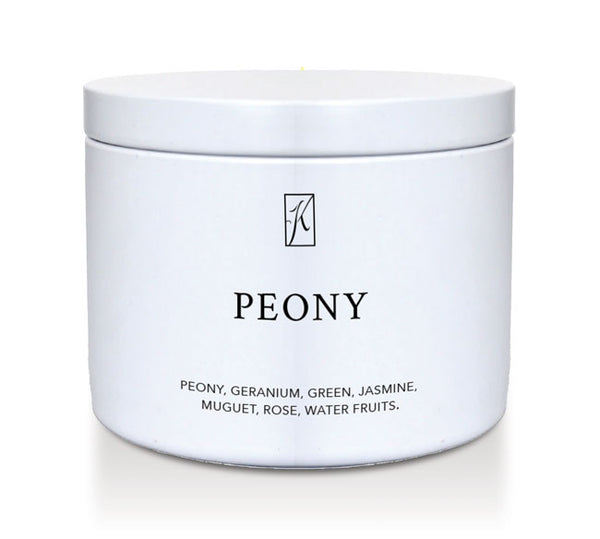 White tin container with 'PEONY' branding and product description on a white background by Kringle Candle.