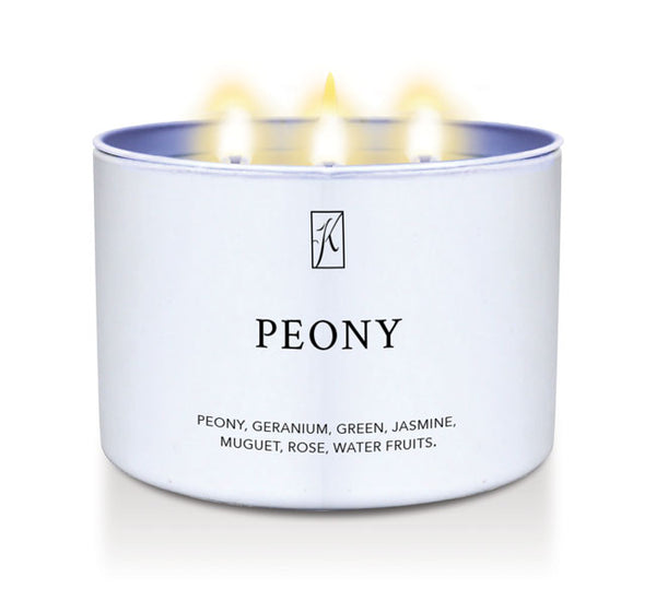 Candle in a white tin container labeled 'Peony' with a logo on a white background.