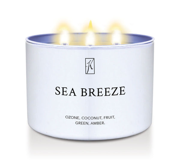 White candle tin container labeled 'Sea Breeze' with a Kringle Candle logo on a white background