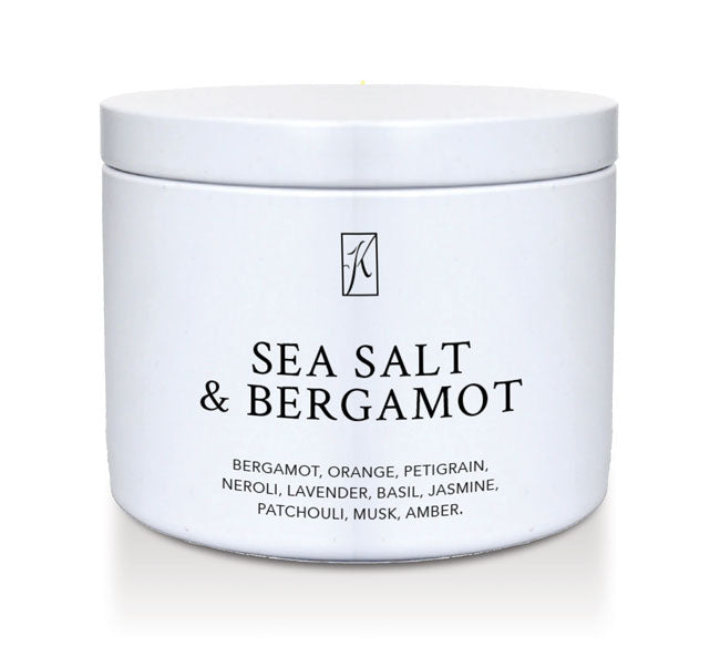 White candle tin labeled 'Sea Salt & Bergamot' on a white background by Kringle Candle