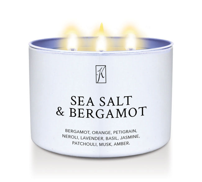 White candle tin labeled 'Sea Salt & Bergamot' on a white background by Kringle Candle