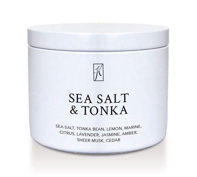 'Sea Salt & Tonka' scented candle in a tin container on a white background by Kringle Candle