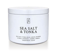 'Sea Salt & Tonka' scented candle in a tin container on a white background by Kringle Candle