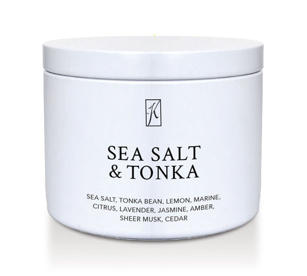 'Sea Salt & Tonka' scented candle in a tin container on a white background by Kringle Candle