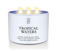 Tropical Waters candle in a white tin  container with a logo on a white background by Kringle Candle.