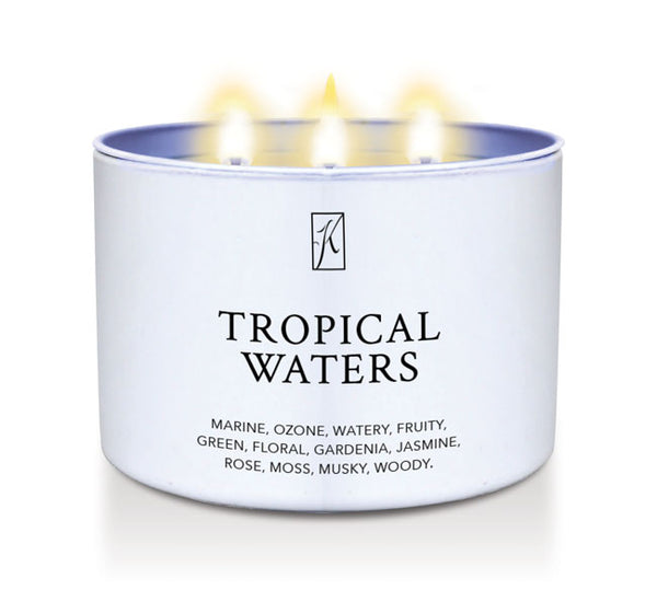 Tropical Waters candle in a white tin  container with a logo on a white background by Kringle Candle.