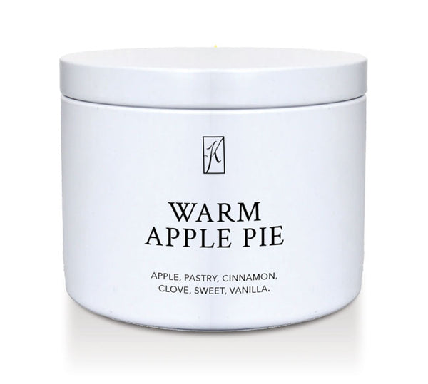 White container of 'Warm Apple Pie' candle with brand logo on a white background