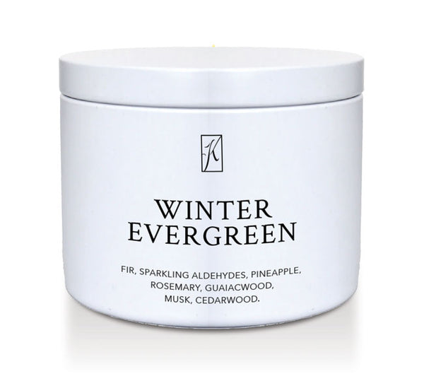 White container of 'Winter Evergreen' candle with a brand logo on a white background