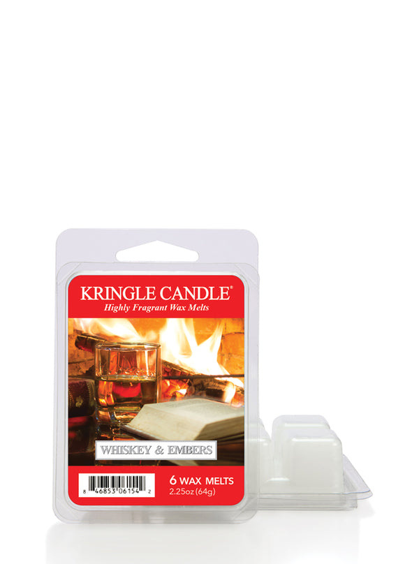 Packaging for "Whiskey & Embers" wax melts. The label shows a whiskey glass by a roaring fireplace.