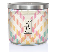 Three-wick candle in a silver tin, featuring a multicolored plaid design and a "K" logo with the word "Kringle" beneath it.