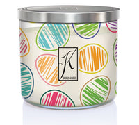 Three-wick candle in a jar with colorful, striped oval patterns and a silver lid. Central logo reads "Kringle."