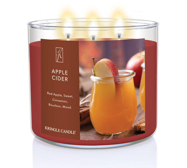 Kringle Candle Apple Cider candle with a glass of apple cider and apples on the label.