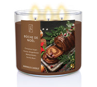 Kringle Candle Buche de Noèl candle with a festive label on a white background