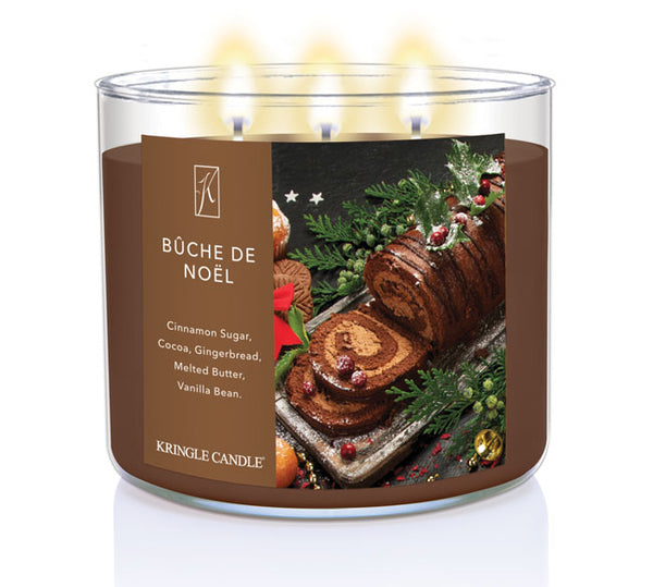 Kringle Candle Buche de Noèl candle with a festive label on a white background