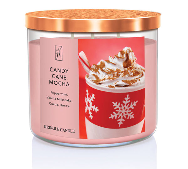 Kringle Candle Candy Cane Mocha candle with a red label featuring a hot chocolate illustration.