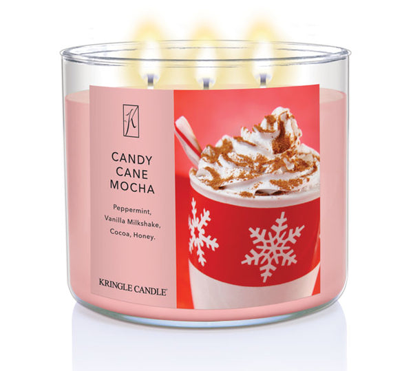 Kringle Candle Candy Cane Mocha candle with a red label featuring a hot chocolate illustration.
