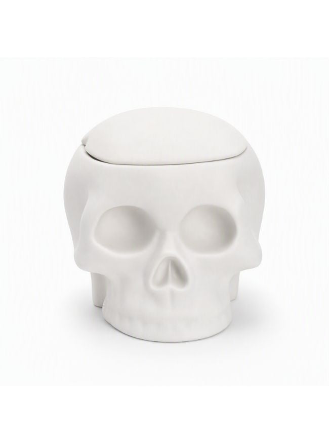 A white skull-shaped container with a matching lid, photographed against a clean white background.