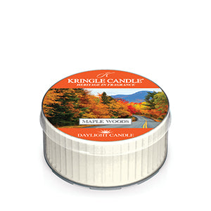 Kringle Candle Maple Woods candle tin with autumn leaf design on a white background