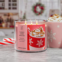 Candle with a 'Candy Cane Mocha' label on a festive background