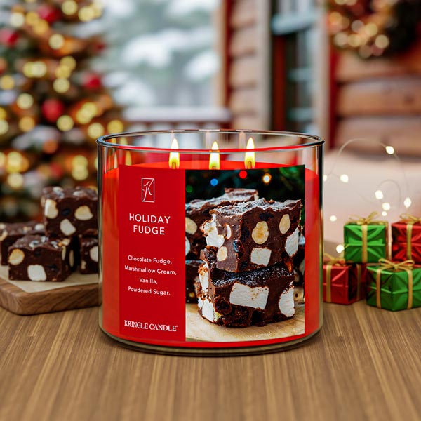 Kringle Candle Holiday Fudge candle with a red label and fudge image with a festive background