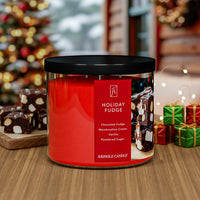 Kringle Candle Holiday Fudge candle with a red label and fudge image with a festive background