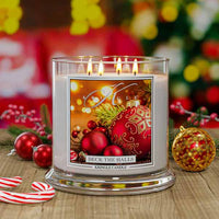 Kringle Candle Christmas-themed candle with festive decorations in the background