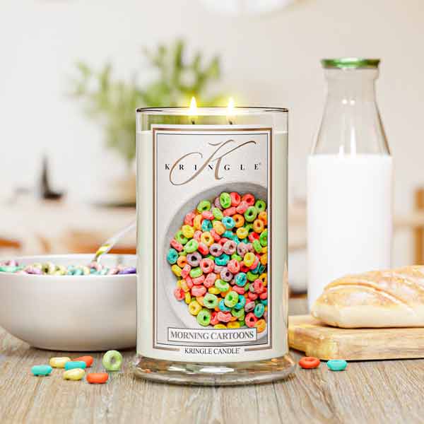 Kringle Candle with colorful label on a table with cereal and milk