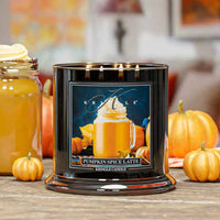 Kringle Candle pumpkin spice latte candle on a table with pumpkins in the background