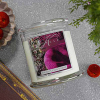 Kringle Candle with 'Sugar Plum & Myrrh' label on a textured surface with decorative elements.