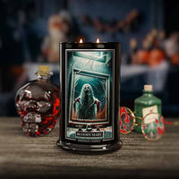 Candle labeled 'Bloody Mary' with a bottle and decorative elements in the background