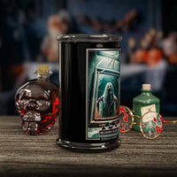 Candle with a ghostly label on a table with decorative bottles in the background