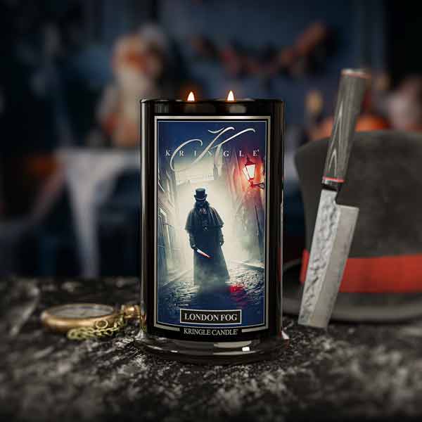 Kringle Candle 'London Fog' with decorative elements on a dark surface