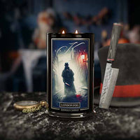 Kringle Candle 'London Fog' with decorative elements on a dark surface