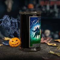 Kringle Candle Halloween-themed candle with decorative elements on a dark background