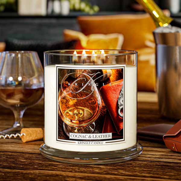 Cognac and leather scented lit 4-wick lit candle by Kringle Candle