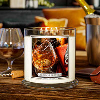 Cognac and leather scented lit 4-wick lit candle by Kringle Candle