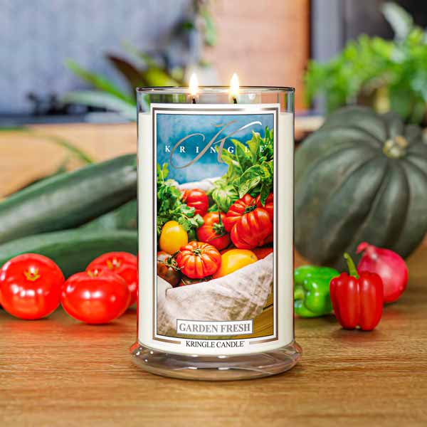 Clear jar candle labeled "Garden Fresh" with an image of assorted tomatoes and greens on the front.
