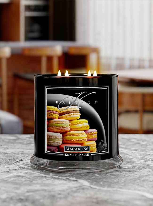 Macrons scented 4-wick lit candle  on a kitchen counter from Kringle Candle Reserve Collection