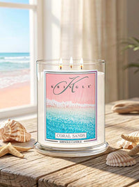 Kringle Candle with 'Coral Sands' design on a beach-themed setting.