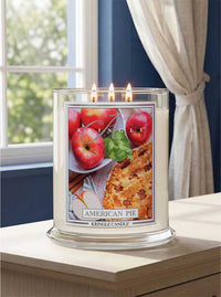 Kringle Candle with 'American Pie' scented candle and apple pie design on a windowsill.