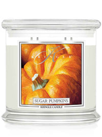 Kringle Candle Sugar Pumpkins 4-wick candle with a pumpkin illustration on a white background