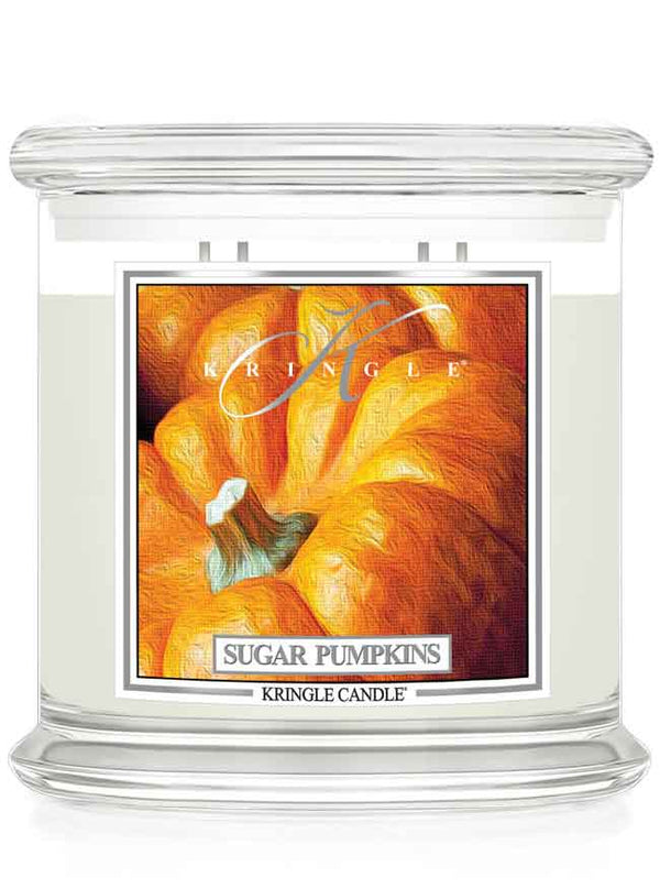 Kringle Candle Sugar Pumpkins 4-wick candle with a pumpkin illustration on a white background