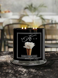 Vanilla Rose Cone 4-wick lit candle from Kringle Candle Reserve Collection on a granite kitchen counter 