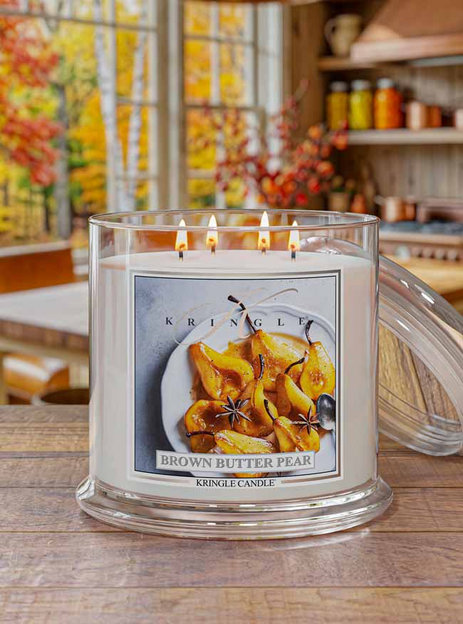 Kringle Candle with 'Brown Butter Pear' label on a wooden surface