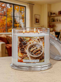 Kringle Candle Cedar Incense candle on a table with a cozy room background